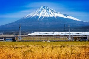 Fuji mountains and high-speed train in Shizuoka, Japan.